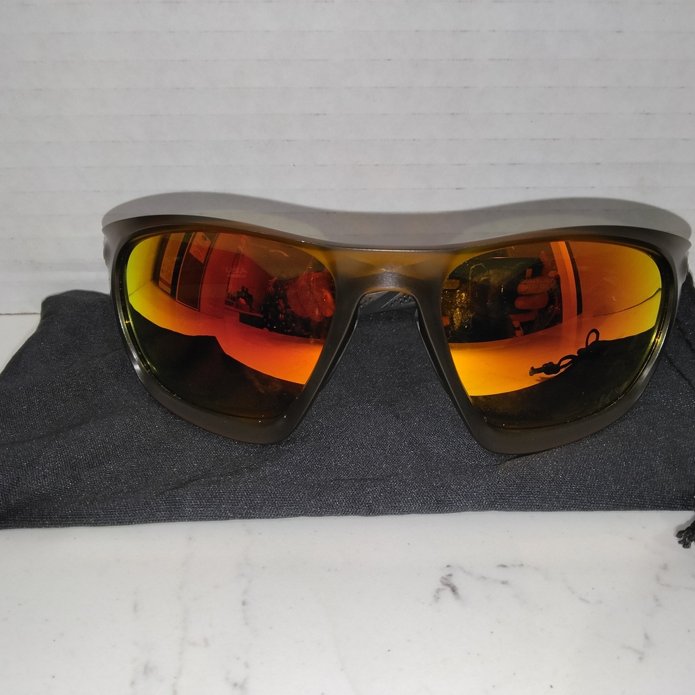 Oakley Stylish Sunglasses with Orange Lenses